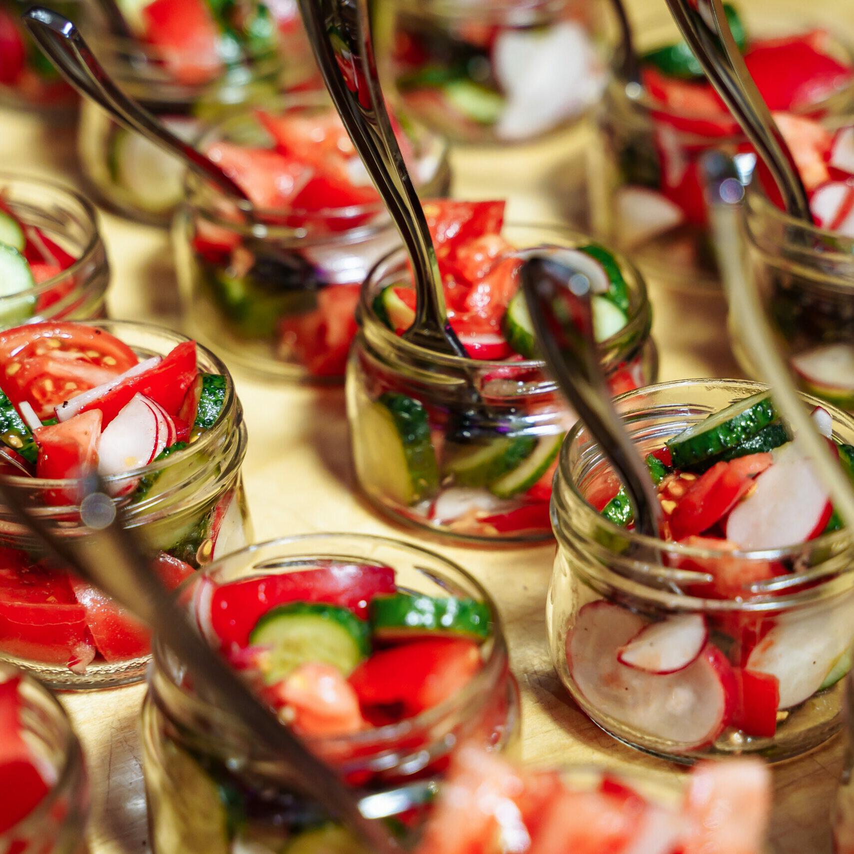 Fresh vegetable salad of tomatoes, cucumbers and radishes